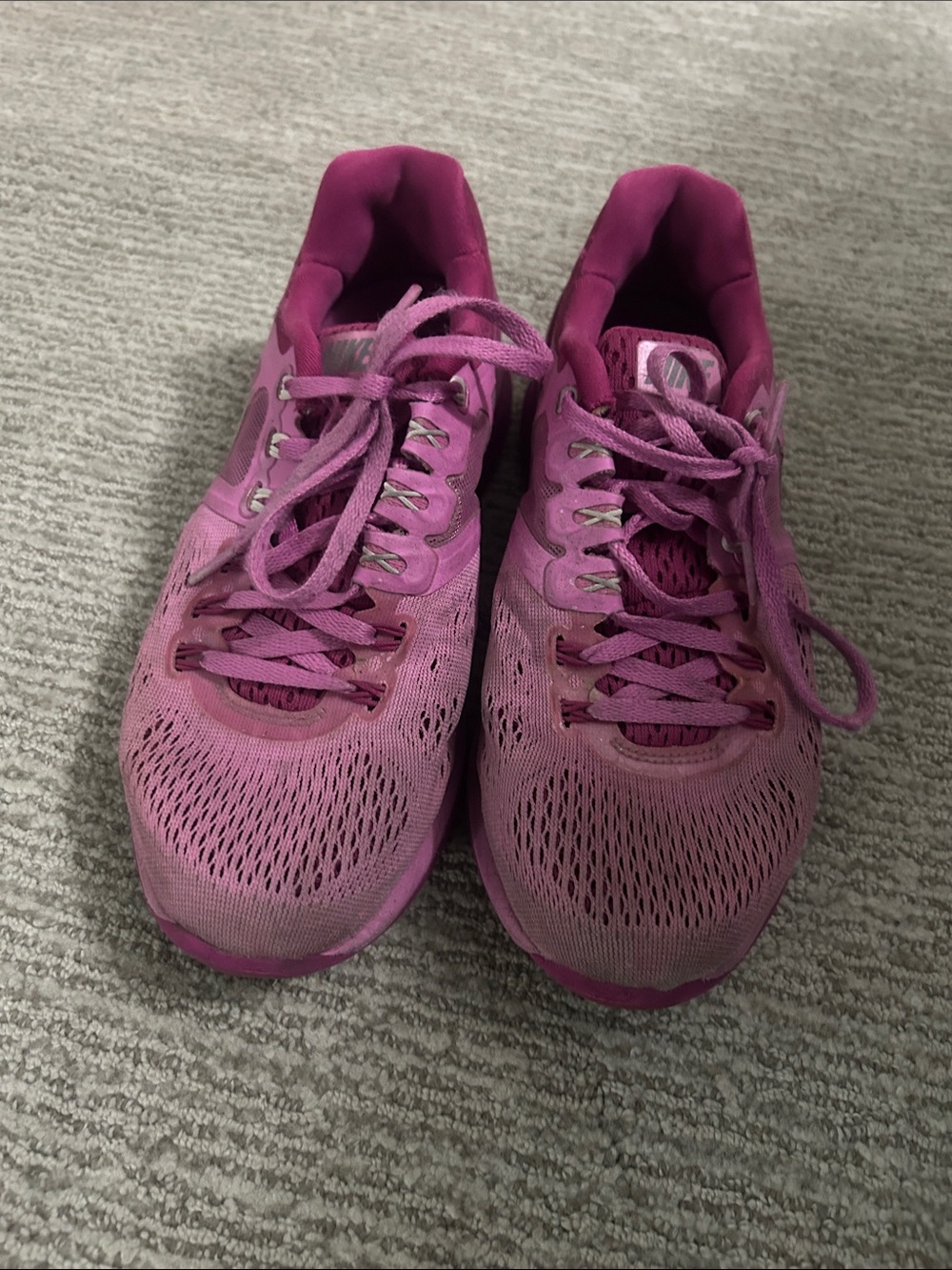 Nike Women's Lunareclipse 4 running shoes in a pink and magenta